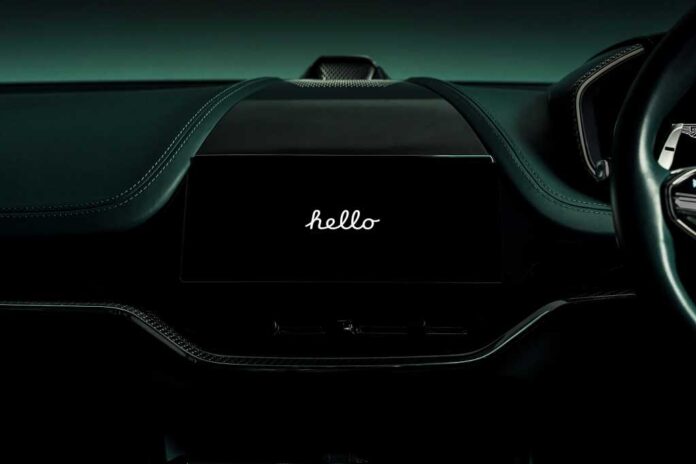 Aston Martin dashboard with Apple CarPlay Ultra saying hello